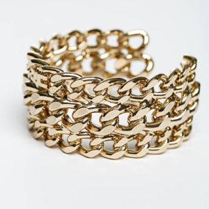 The golden bracelet isolated on white background